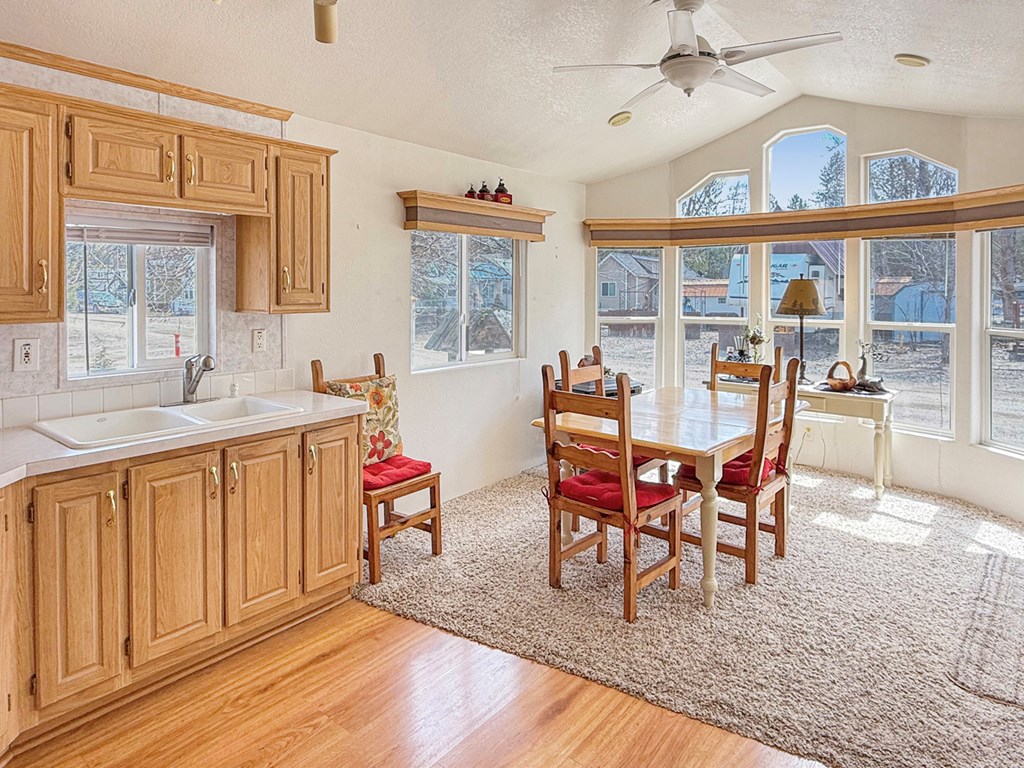 46 B Street Cascade, ID 83611 - Photo 6 of 24 Enjoy a Sunny Well-Lit Kitchen & Dining Room