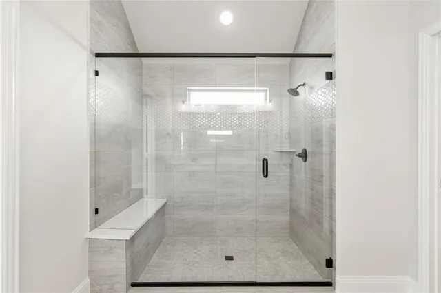 a bathroom with a sink vanity and a mirror