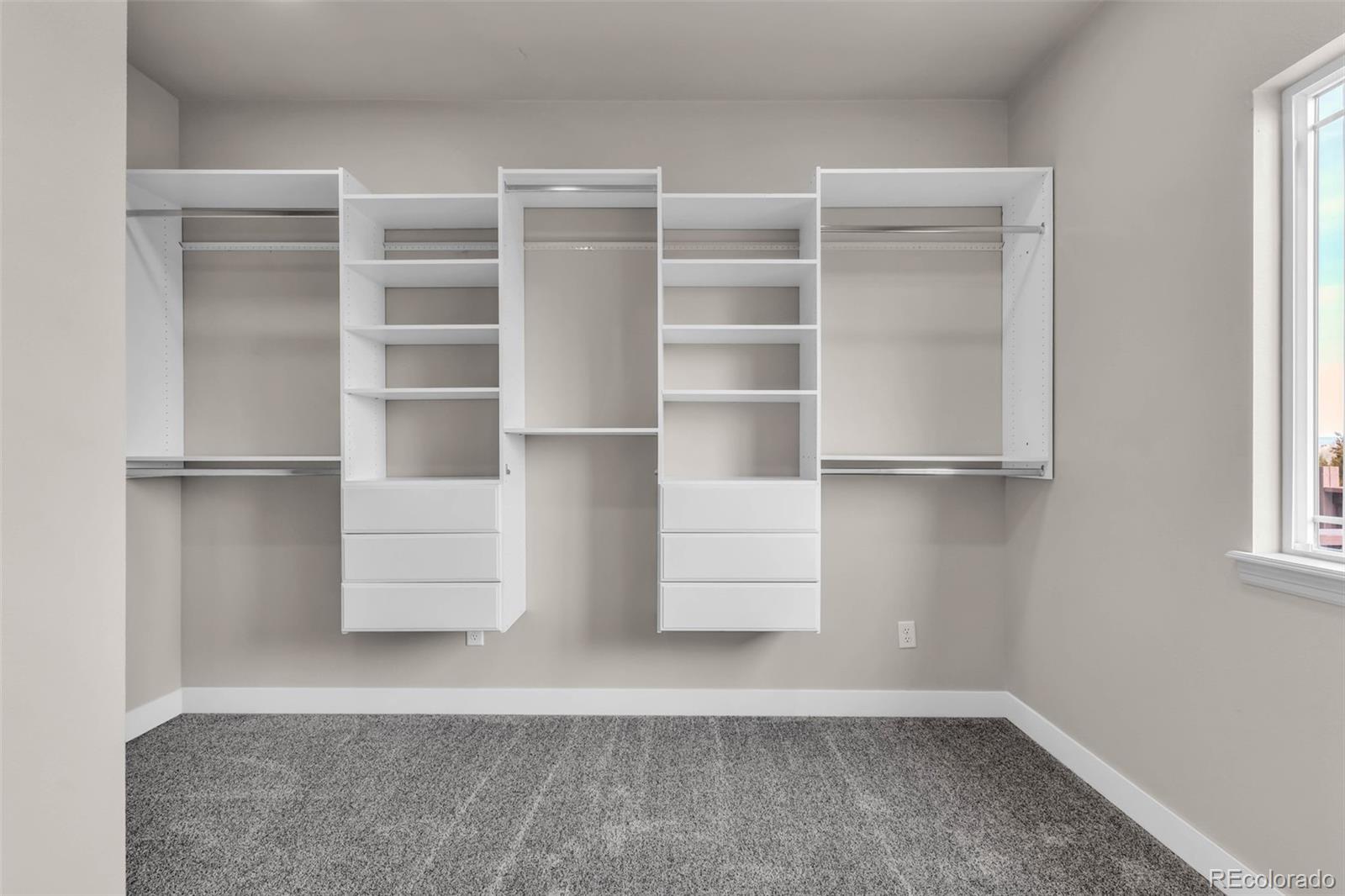 249 High Meadows Drive Florence, CO 81226 - Photo 20 of 47 a view of walk in closet with empty racks
