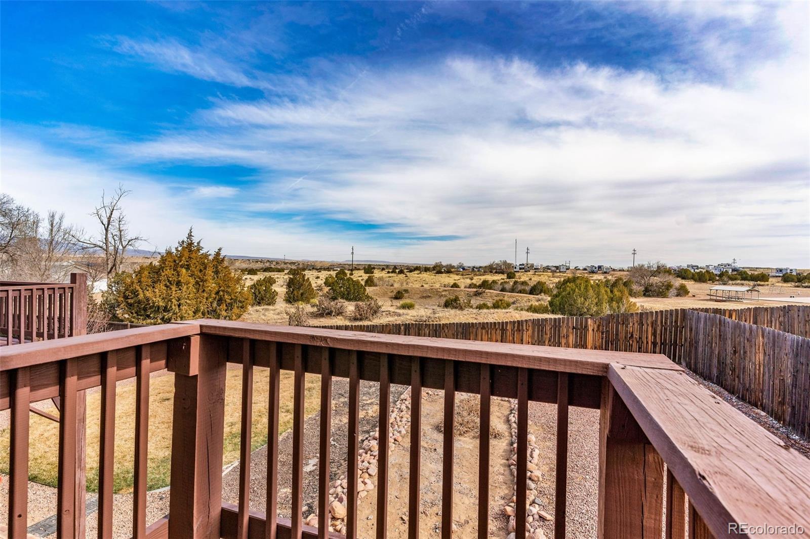 249 High Meadows Drive Florence, CO 81226 - Photo 24 of 47 a view of city from a balcony