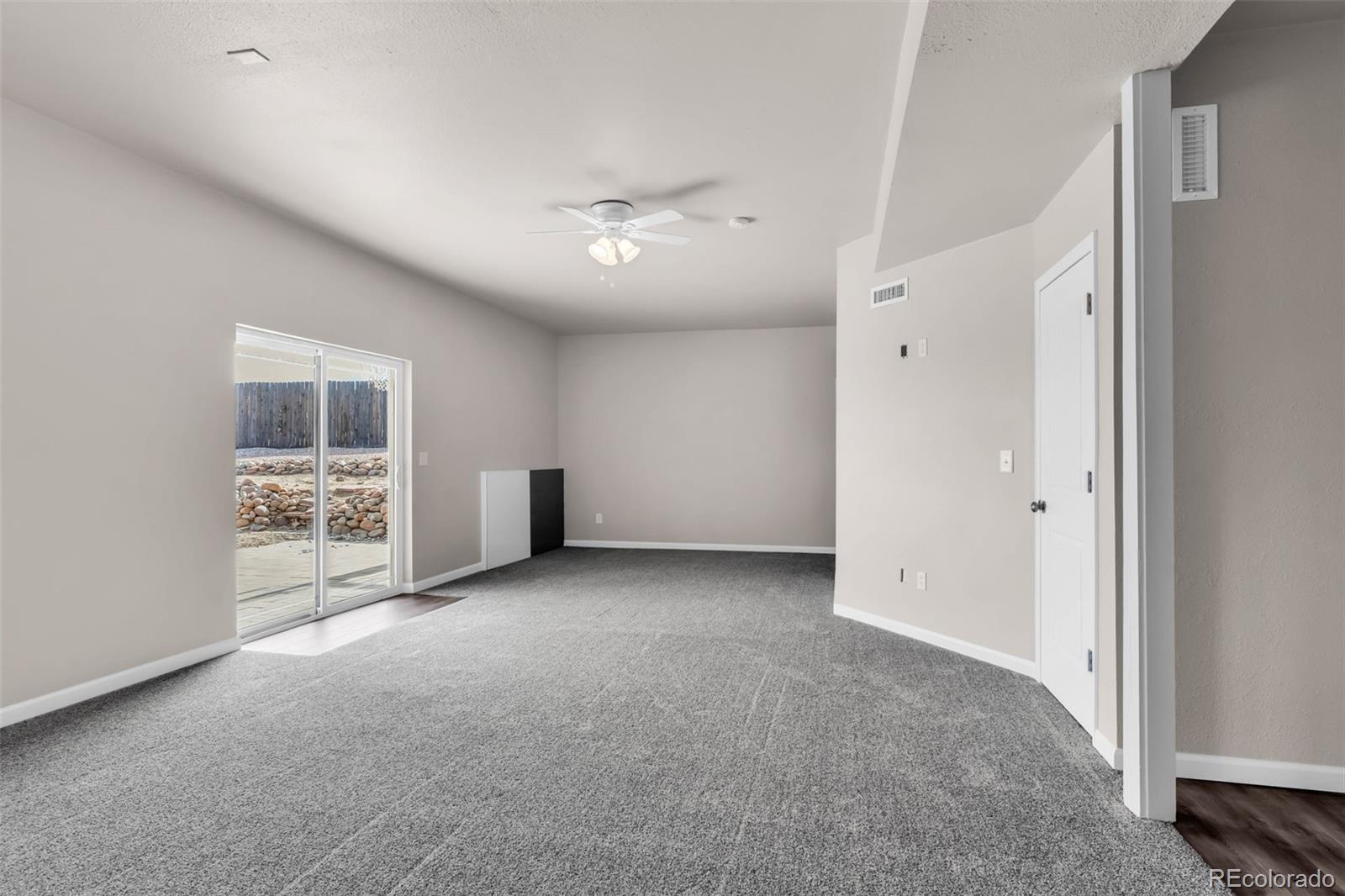 249 High Meadows Drive Florence, CO 81226 - Photo 28 of 47 a view of an empty room with a window