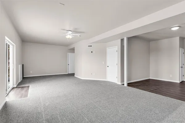 an empty room with a bathroom