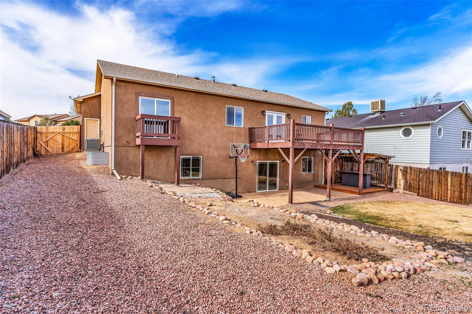 249 High Meadows Drive Florence, CO 81226 - Photo 3 of 47 a view of a house with a patio