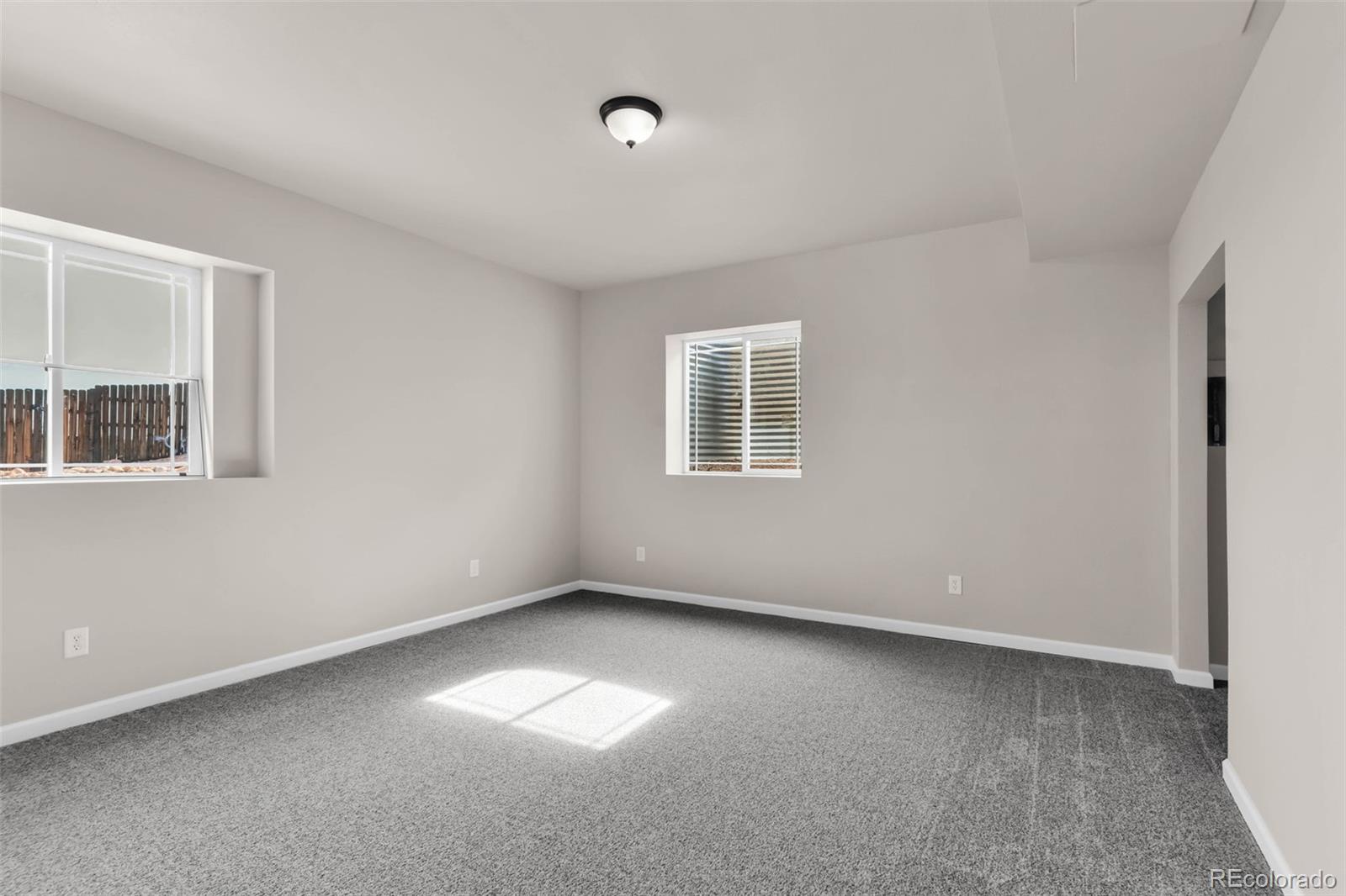 249 High Meadows Drive Florence, CO 81226 - Photo 31 of 47 a view of an empty room with a window