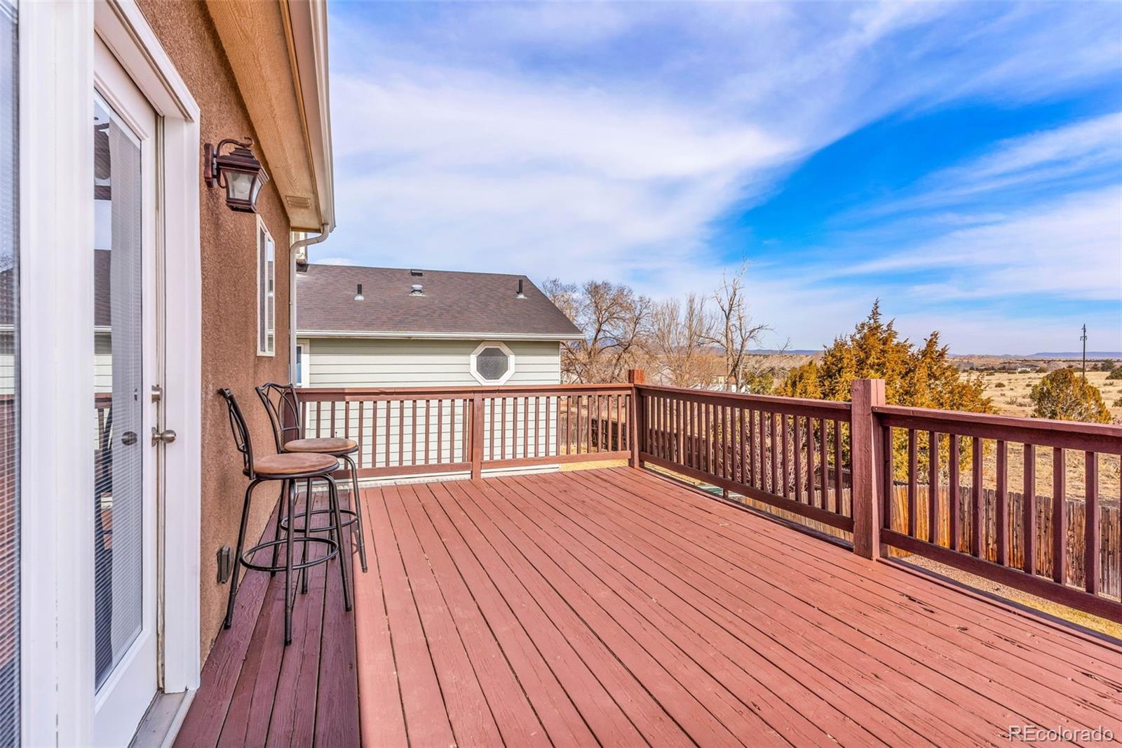 249 High Meadows Drive Florence, CO 81226 - Photo 35 of 47 a view of balcony with wooden floor