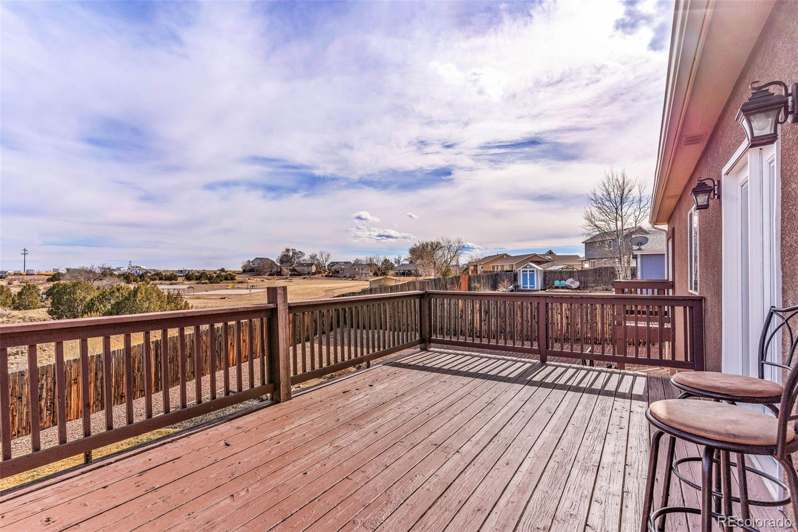 249 High Meadows Drive Florence, CO 81226 - Photo 36 of 47 a view of a balcony with wooden floor