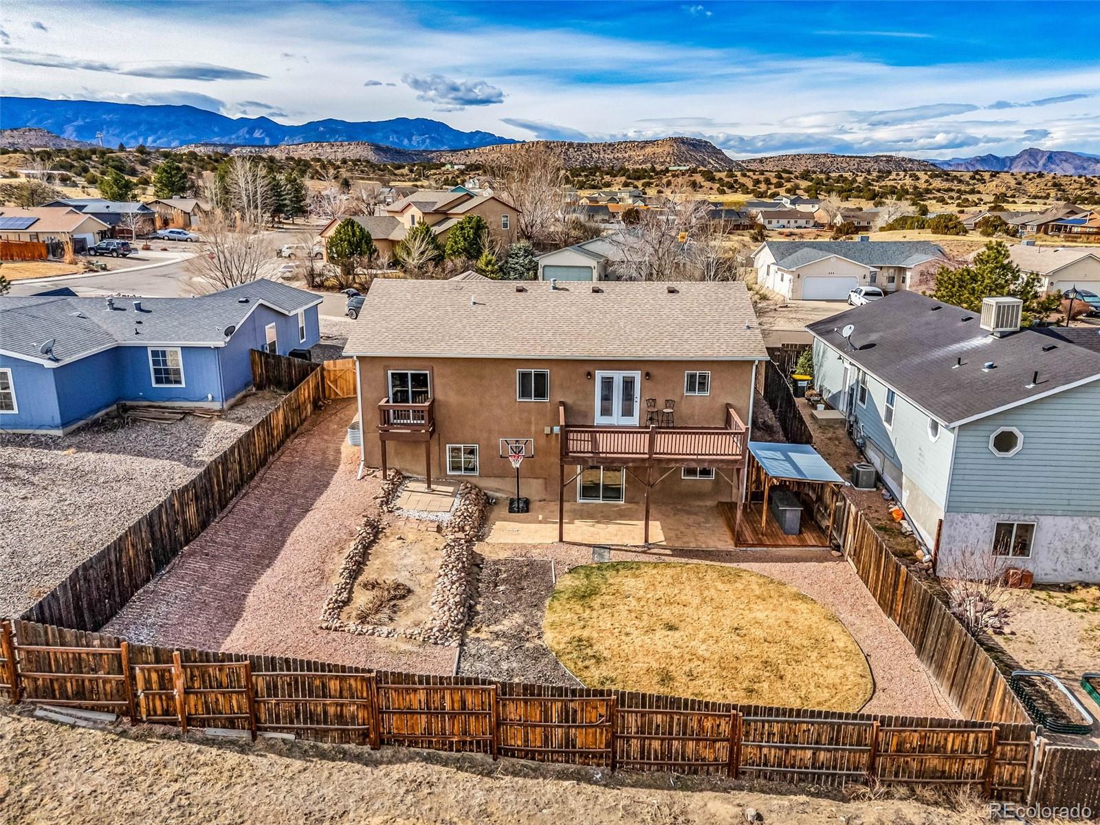 249 High Meadows Drive Florence, CO 81226 - Photo 39 of 47 an aerial view of residential houses with outdoor space