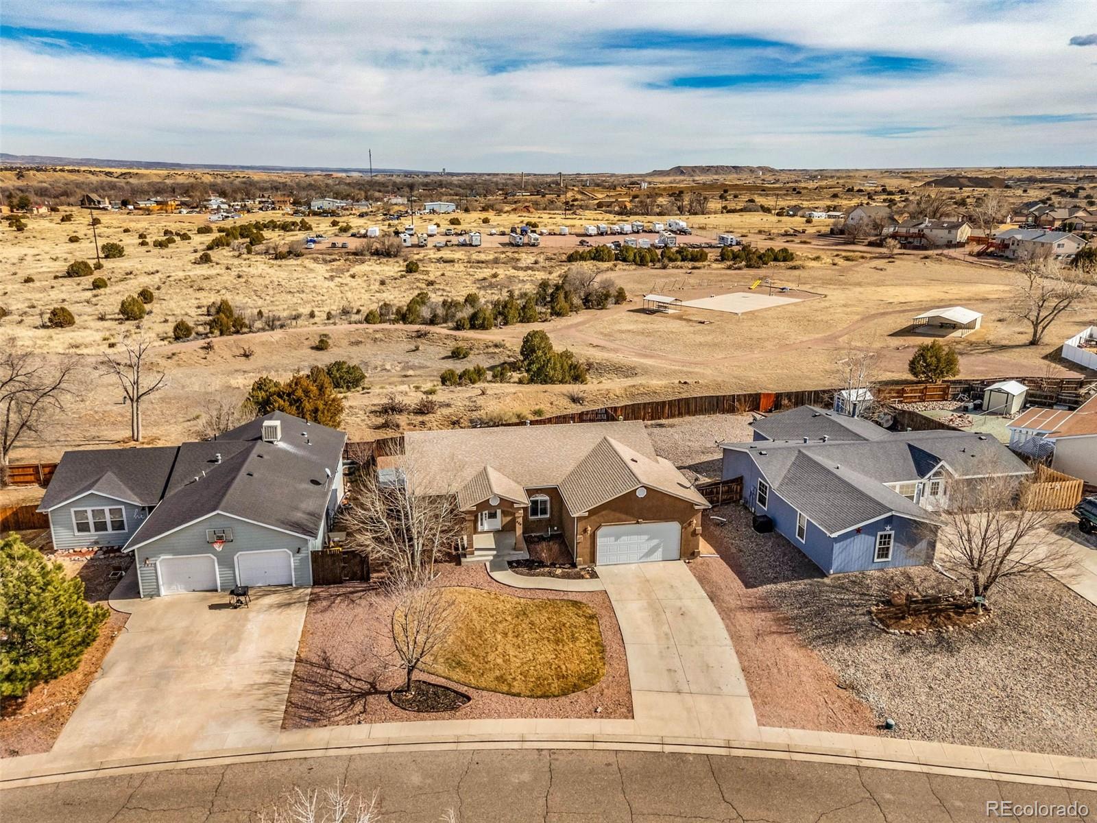 249 High Meadows Drive Florence, CO 81226 - Photo 41 of 47 an aerial view of residential building with ocean view