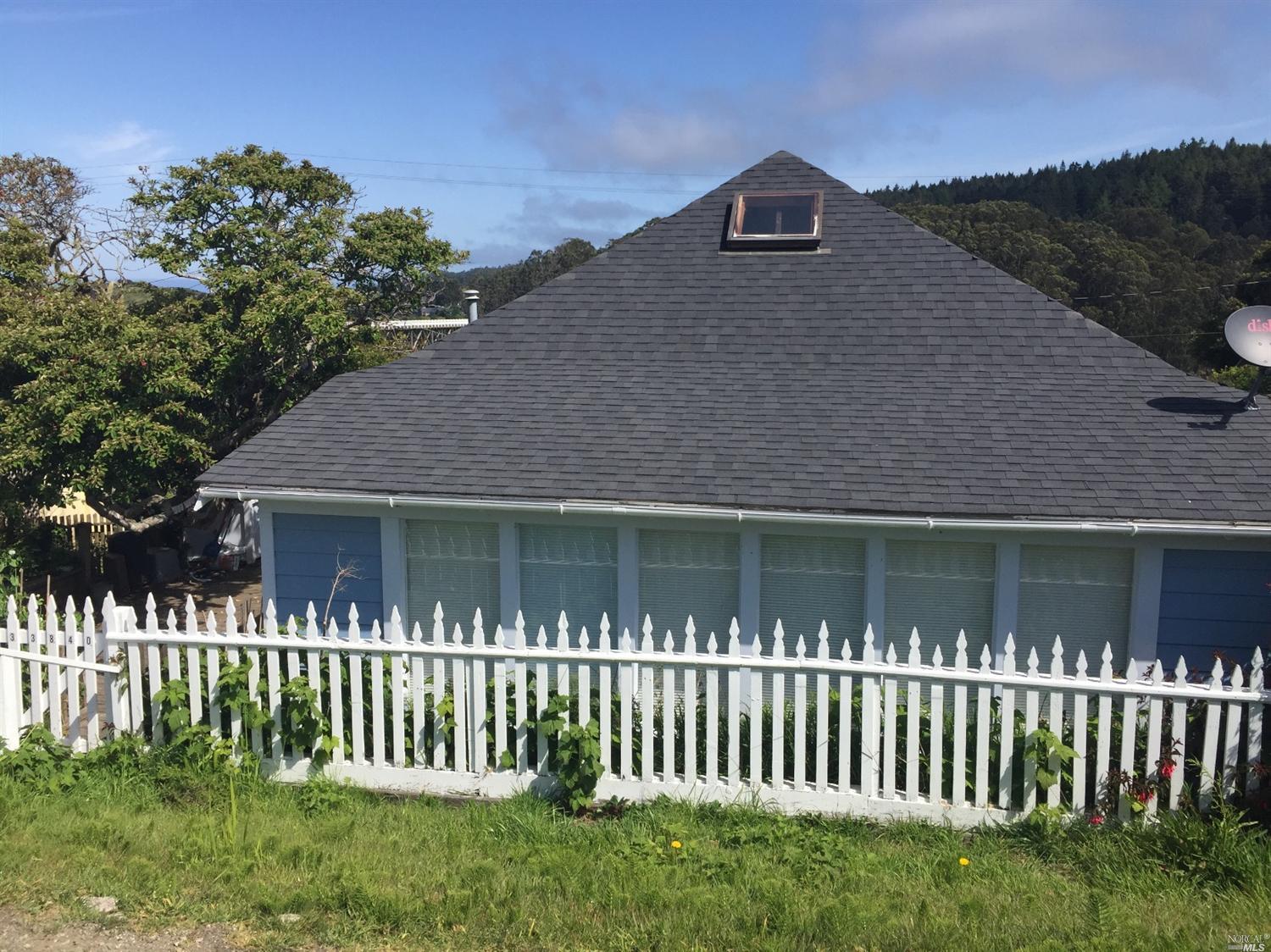 33840 Albion Ridge Road Albion, CA 95410 - Photo 1 of 1 a front view of a house with a garden