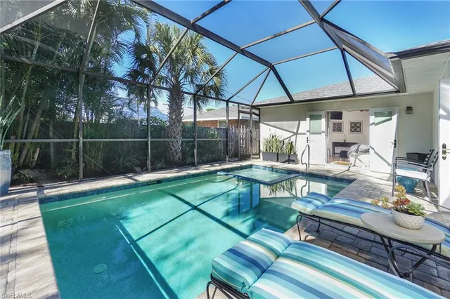 a view of a chairs and table in the patio