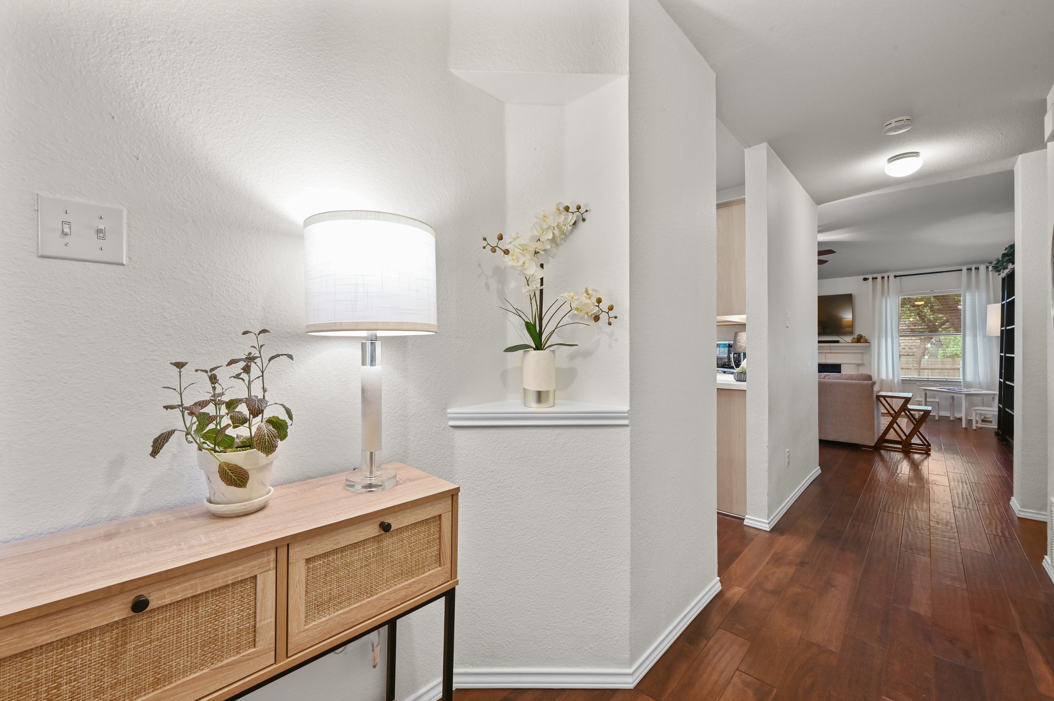 1409 Knoll Ridge Drive Cedar Park, TX 78613 - Photo 6 of 30 Rich hardwood floors welcome you into this inviting interior, leading to an open-concept living space.