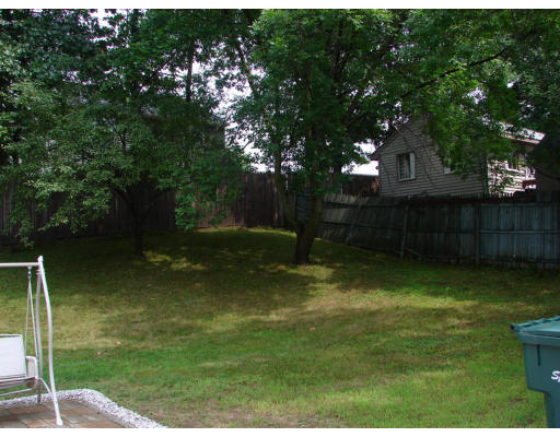 49 Finch Road Springfield, MA 01119 - Photo 3 of 7 a backyard of a house with lots of green space