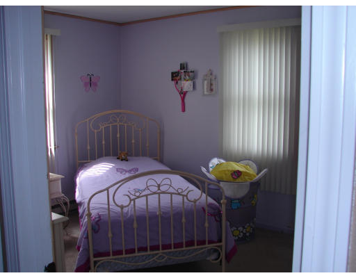 49 Finch Road Springfield, MA 01119 - Photo 5 of 7 a bedroom with a bed and a window