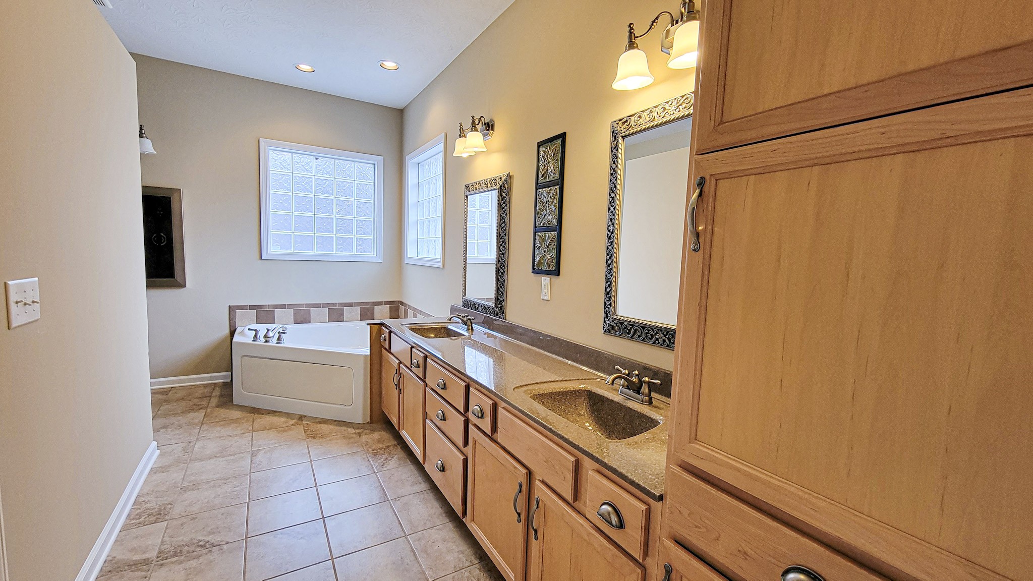 4200 Sandy Springs Road Springfield, TN 37172 - Photo 30 of 34 a bathroom with a tub sink and mirror