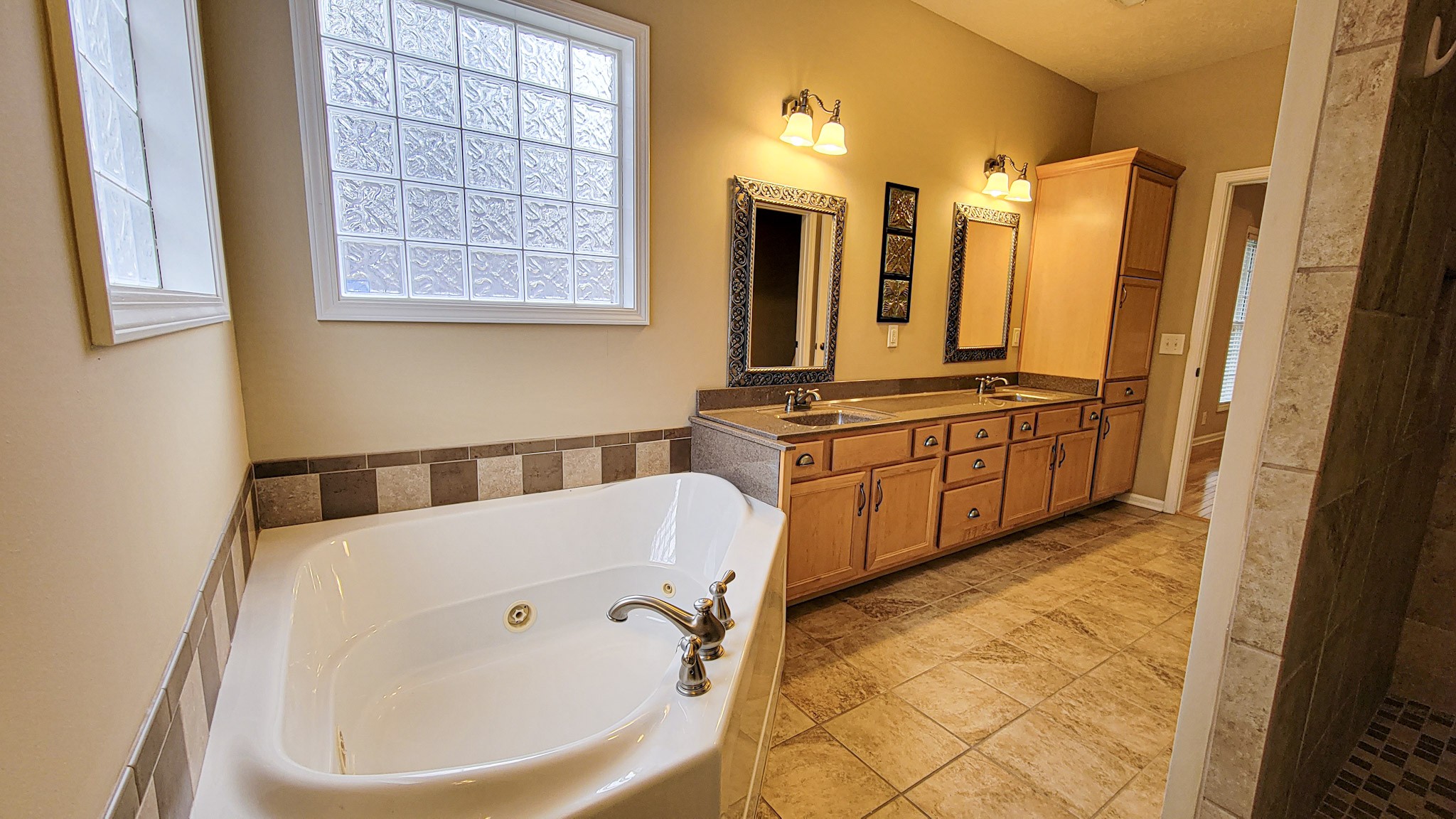 4200 Sandy Springs Road Springfield, TN 37172 - Photo 31 of 34 a bathroom with a tub sink and mirror