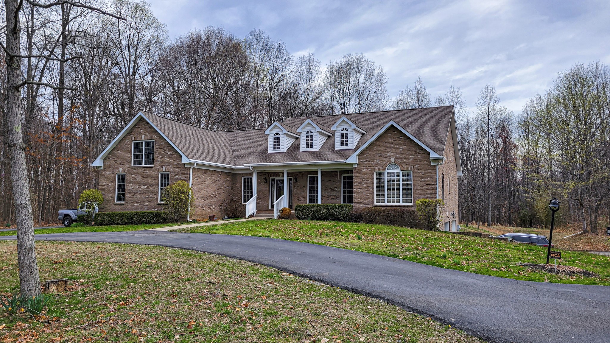 4200 Sandy Springs Road Springfield, TN 37172 - Photo 7 of 34 a front view of a house with a yard and garage