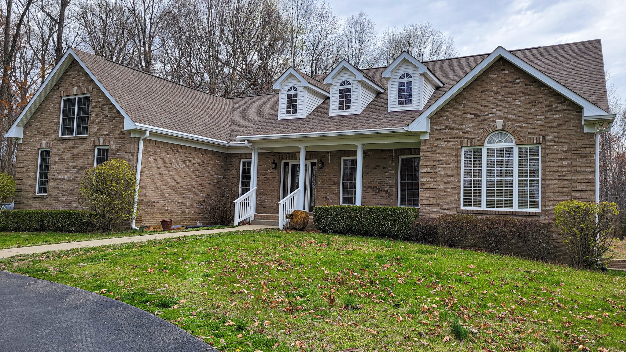 4200 Sandy Springs Road Springfield, TN 37172 - Photo 8 of 34 a front view of a house with a yard and garage