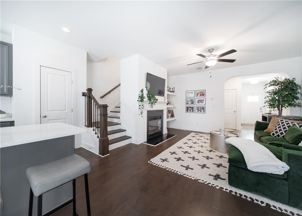 6350 Princeton Ridge Drive Lithonia, GA 30058 - Photo 17 of 45 a living room with furniture and wooden floor
