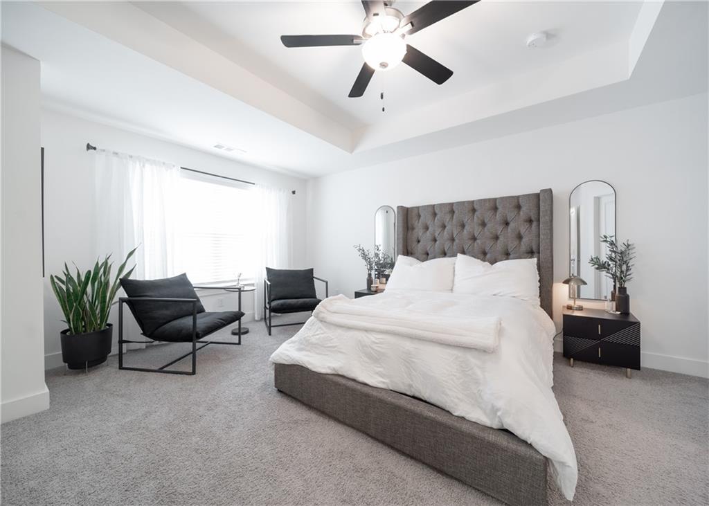 6350 Princeton Ridge Drive Lithonia, GA 30058 - Photo 30 of 45 a bedroom with a bed and furniture