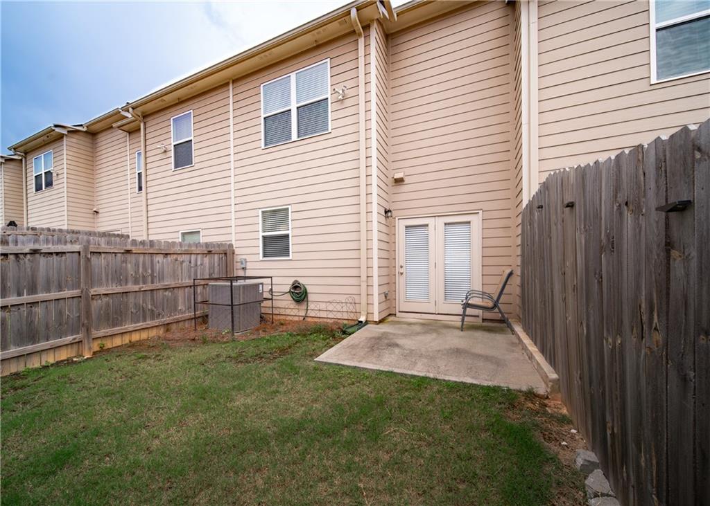6350 Princeton Ridge Drive Lithonia, GA 30058 - Photo 43 of 45 a view of backyard with wooden fence
