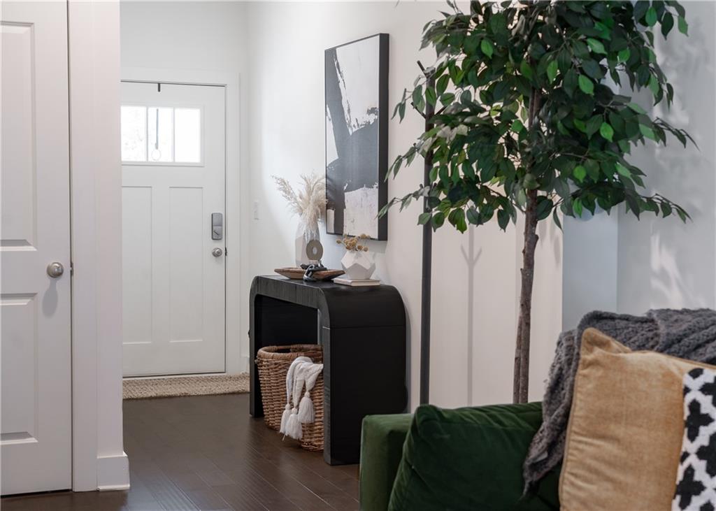 6350 Princeton Ridge Drive Lithonia, GA 30058 - Photo 5 of 45 a living room with furniture and a potted plant