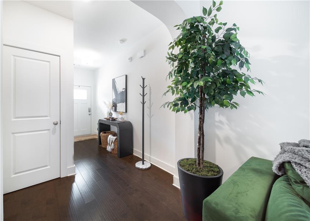 6350 Princeton Ridge Drive Lithonia, GA 30058 - Photo 6 of 45 a living room with furniture and a potted plant