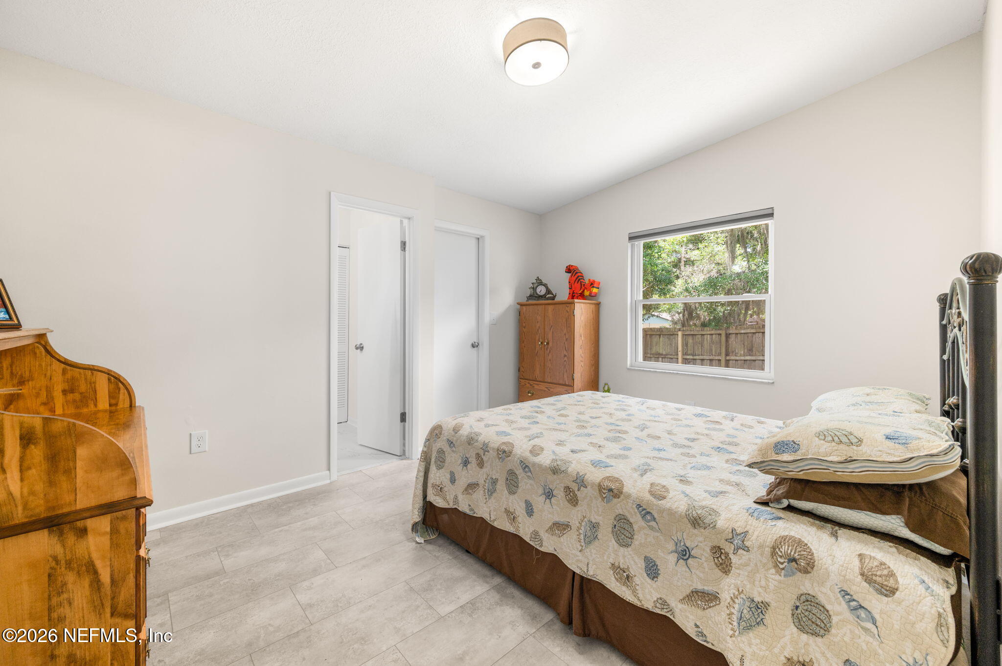 507 Gentian Road St. Augustine, FL 32086 - Photo 34 of 82 a bedroom with a bed and a window