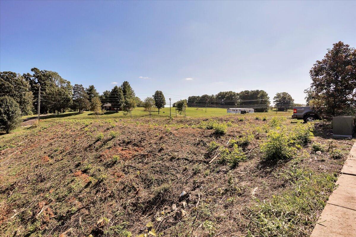 Lot 9 Celebration Avenue Moneta, VA 24121 - Photo 13 of 16 a view of a dry yard with trees