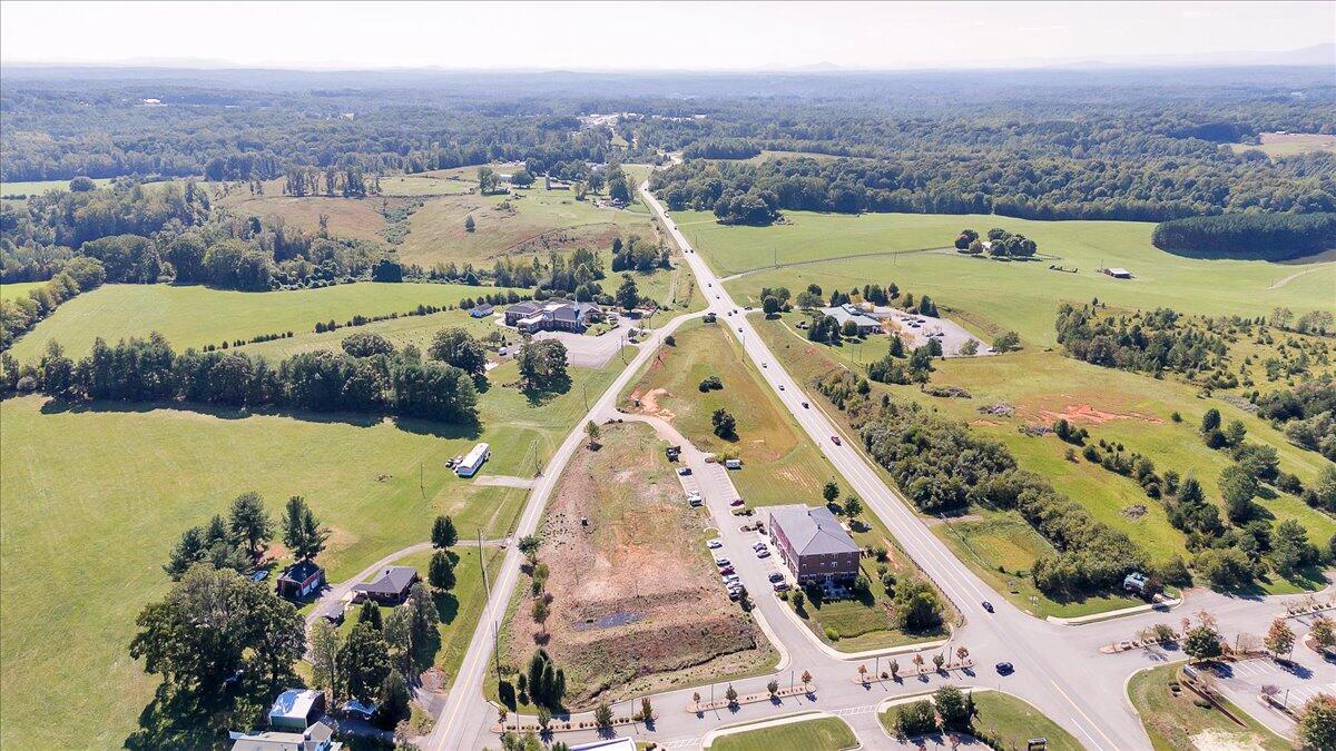 Lot 9 Celebration Avenue Moneta, VA 24121 - Photo 7 of 16 an aerial view of a house with a lake view