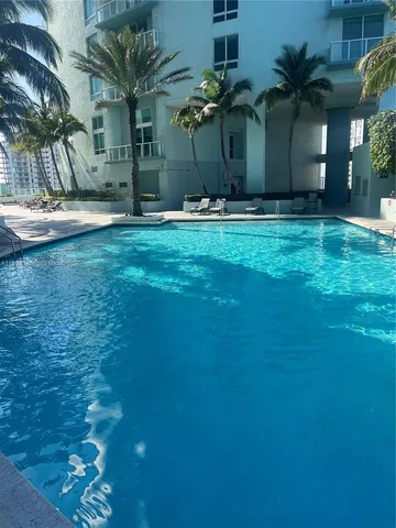 a view of building with yard