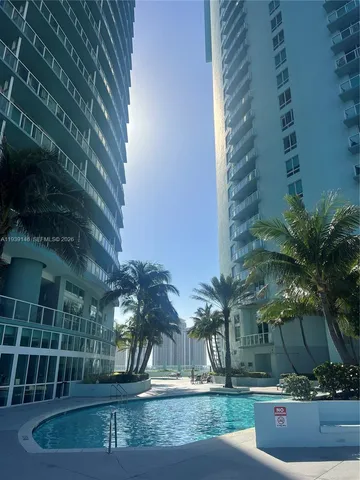 a view of a yard with a chair
