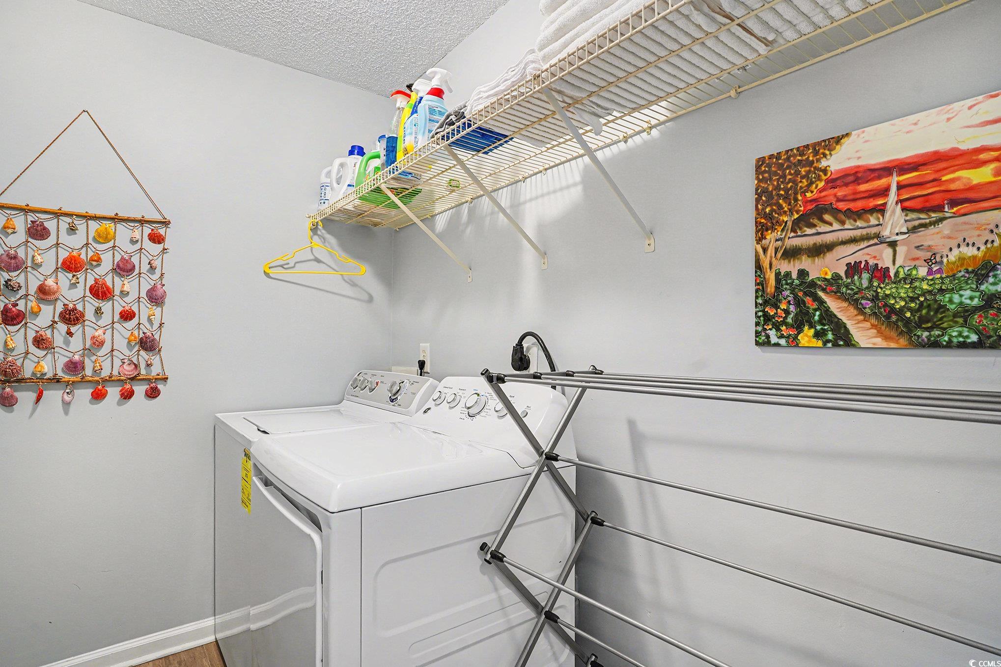 3756 Citation Way, Unit 926 Myrtle Beach, SC 29577 - Photo 25 of 35 Laundry area featuring a textured ceiling and independent washer and dryer