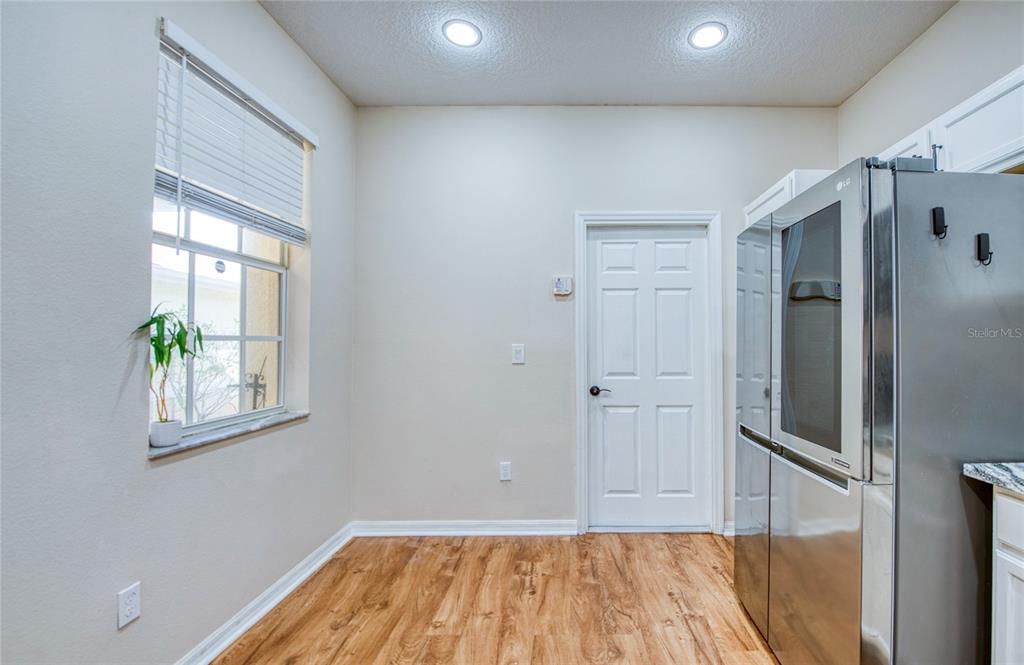 648 Spring Lake Circle Tarpon Springs, FL 34688 - Photo 12 of 30 an empty room with windows and closet
