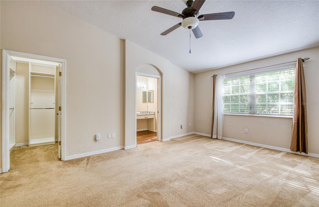 648 Spring Lake Circle Tarpon Springs, FL 34688 - Photo 15 of 30 a view of an empty room with a window