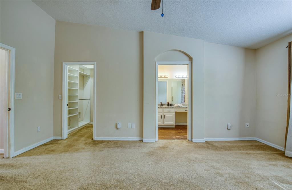 648 Spring Lake Circle Tarpon Springs, FL 34688 - Photo 17 of 30 an empty room with a bathroom and a sink