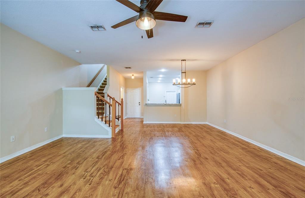648 Spring Lake Circle Tarpon Springs, FL 34688 - Photo 7 of 30 a view of empty room with wooden floor