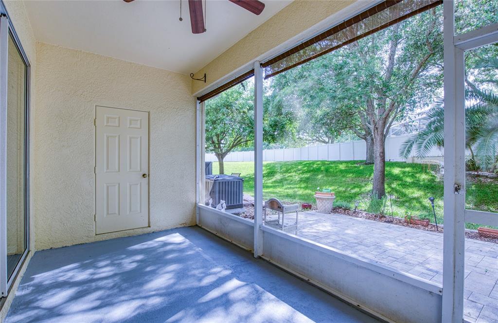 648 Spring Lake Circle Tarpon Springs, FL 34688 - Photo 8 of 30 a view of room with large trees and plants