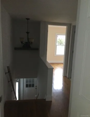 a view of empty room with windows