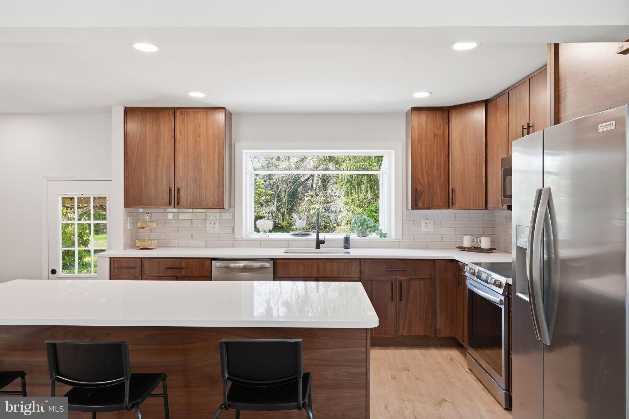 409 South Providence Road Wallingford, PA 19086 - Photo 31 of 106 Modern kitchen with natural light.
