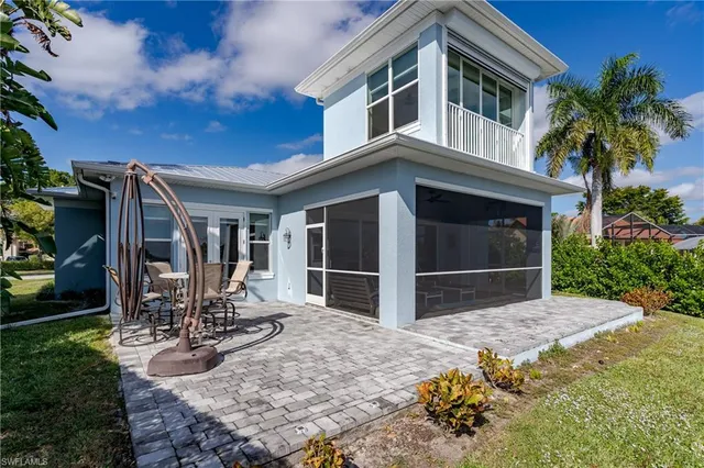 a house with trees in front of it