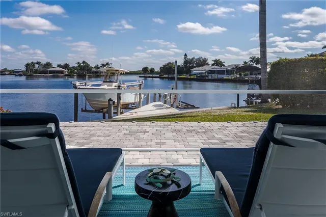 a view of a swimming pool with a terrace