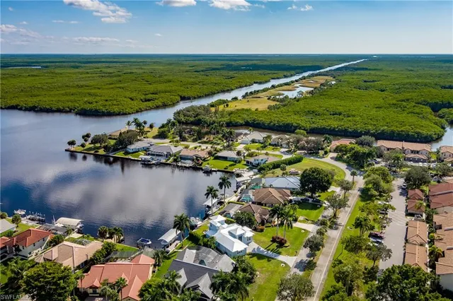 a view of a lake with a houses