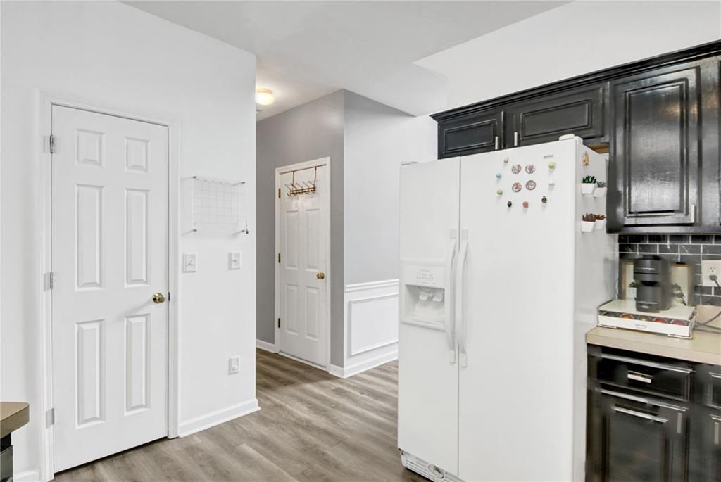 105 Fate Court Dallas, GA 30157 - Photo 13 of 32 a white refrigerator freezer sitting inside of a kitchen
