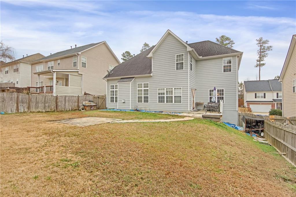 105 Fate Court Dallas, GA 30157 - Photo 30 of 32 a view of a house with a swimming pool