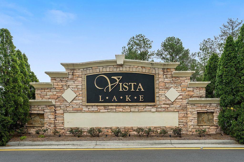 105 Fate Court Dallas, GA 30157 - Photo 32 of 32 a building with trees in front of it