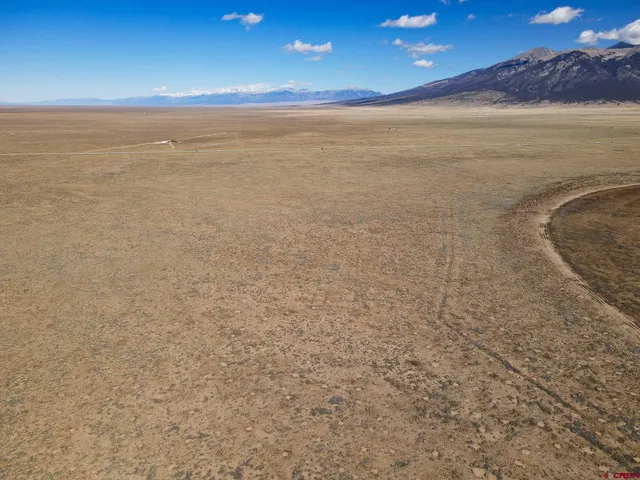 a view of an ocean and a yard