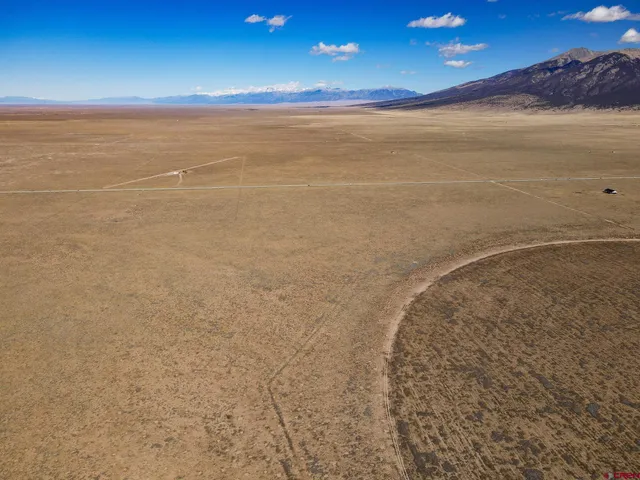 a view of an ocean and a yard