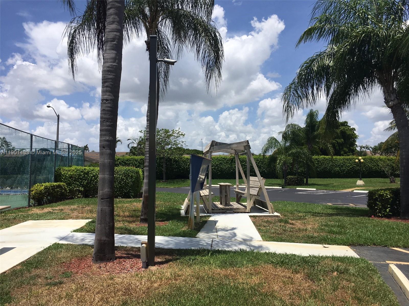 653 Waterside Drive, Unit 653 Hypoluxo, FL 33462 - Photo 12 of 12 a view of a park