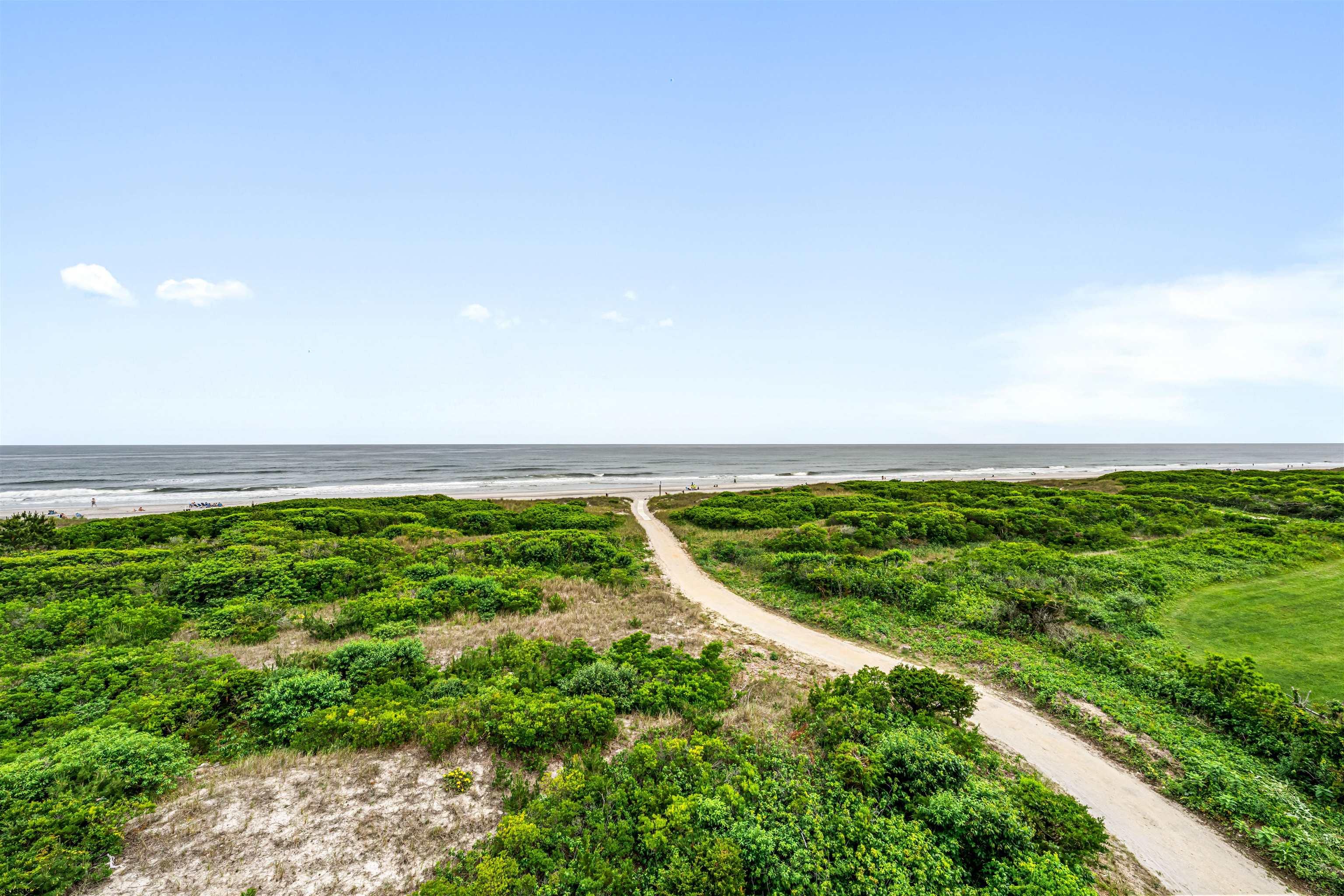 321 6th Street South, Unit 14 Brigantine, NJ 08203 - Photo 12 of 21 a view of a field with an ocean