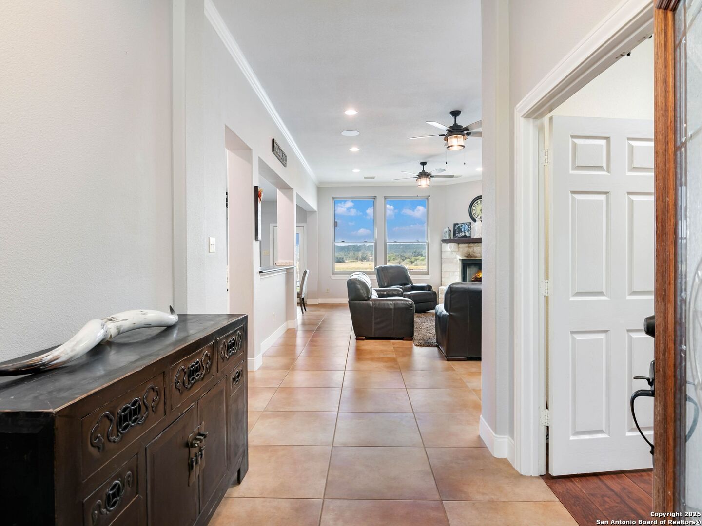 272 Schaper Road Fredericksburg, TX 78624 - Photo 11 of 62 a kitchen with a stove cabinets and a refrigerator